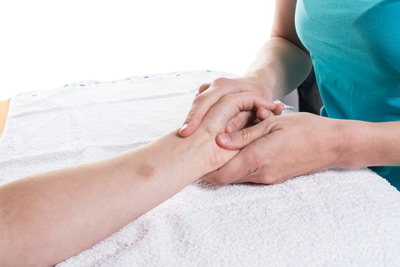 person getting a hand massage